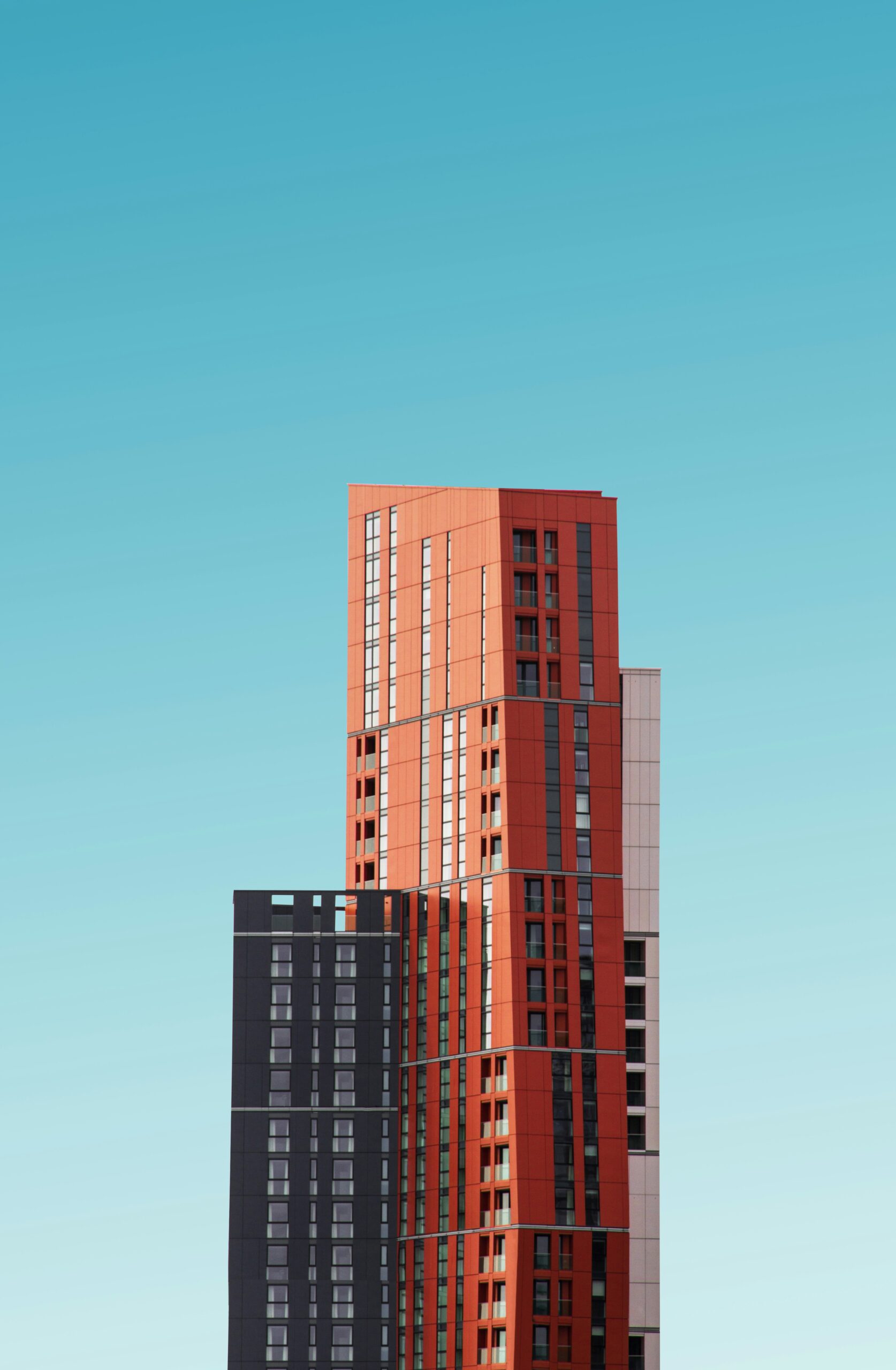 nscape studio orange and black high rise building